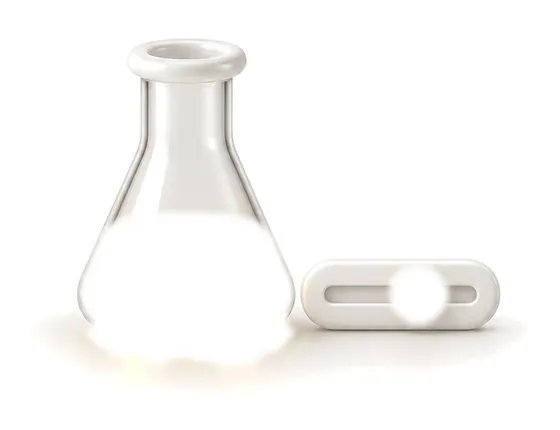 Flask of golden oil beside a slider